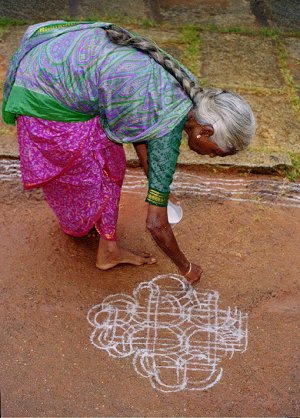 Woman Decorates Front Yard