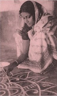 Girl Painting Rangoli in Calcutta