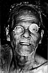 Halakki Tribal man in broken eye glasses