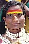 Man Dressed as Woman in Devotion